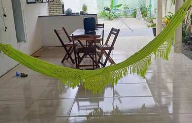 Imagem: A casa possui 2 Dormitórios, 2 Banheiros, 2 Vagas na garagem