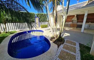 Imagem: A casa em condomínio possui 3 Dormitórios, 4 Banheiros, 2