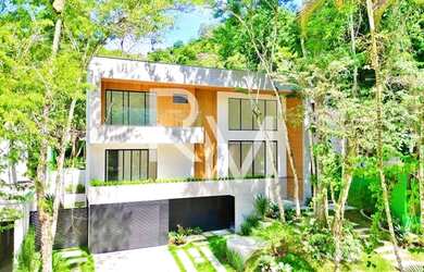 Imagem: A casa em condomínio possui 5 Dormitórios, 5 Banheiros, 3