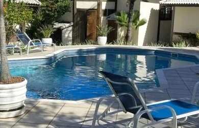 Imagem: A casa em condomínio possui 4 Dormitórios, 5 Banheiros, 5