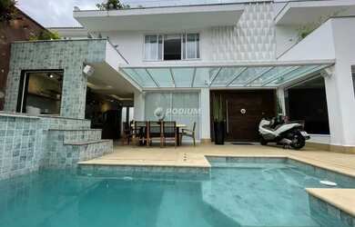 Imagem: A casa em condomínio à venda possui 3 Dormitórios, 5 Banheiros