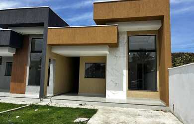 Imagem: A casa possui 3 Dormitórios, 2 Banheiros, 2 Vagas na garagem