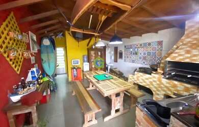 Imagem: A casa possui 3 Dormitórios, 3 Banheiros, 3 Vagas na garagem