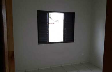 Imagem: A casa possui 3 Dormitórios, 1 Vaga na garagem e está localizado