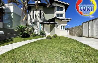 Imagem 2: Casa para venda com lareira e quintal em condomínio de Arujá