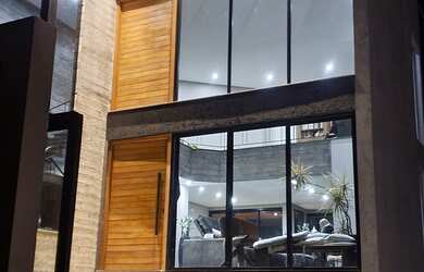 Imagem: A casa possui 3 Dormitórios, 4 Banheiros, 4 Vagas na garagem