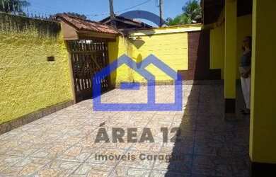 Imagem: A casa possui 2 Dormitórios, 1 Banheiro, 2 Vagas na garagem