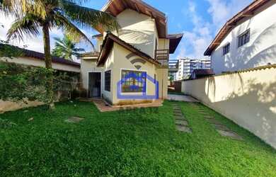 Imagem: A casa possui 3 Dormitórios, 3 Banheiros, 3 Vagas na garagem