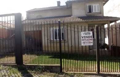 Imagem: A casa possui 3 Dormitórios, 1 Banheiro, 4 Vagas na garagem