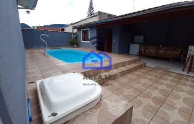 Imagem: A casa possui 3 Dormitórios, 4 Banheiros, 4 Vagas na garagem