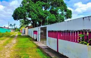 Imagem: A casa possui 3 Dormitórios, 2 Banheiros, 5 Vagas na garagem