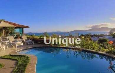 Imagem: A casa possui 5 Dormitórios, 5 Banheiros, 5 Vagas na garagem