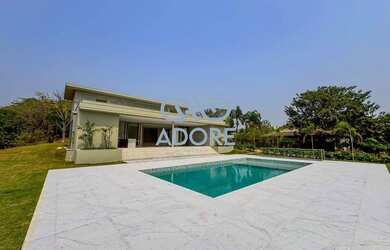 Imagem: A casa em condomínio possui 5 Dormitórios, 5 Banheiros, 4