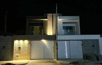 Imagem: A casa possui 3 Dormitórios, 3 Banheiros, 3 Vagas na garagem