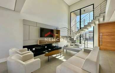 Imagem: A casa em condomínio possui 4 Dormitórios, 5 Banheiros, 2