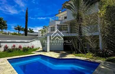 Imagem: A casa em condomínio possui 5 Dormitórios, 5 Banheiros, 5