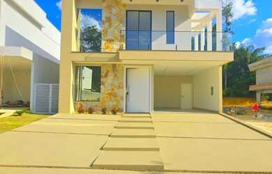 Imagem: A casa possui 5 Dormitórios, 5 Banheiros, 4 Vagas na garagem