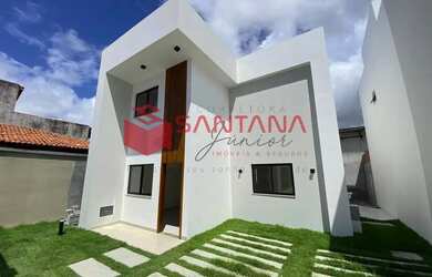 Imagem: A casa possui 4 Dormitórios, 1 Banheiro, 2 Vagas na garagem