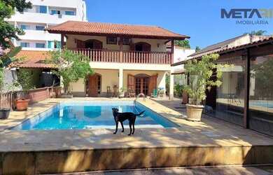 Imagem: A casa possui 4 Dormitórios, 5 Banheiros, 5 Vagas na garagem