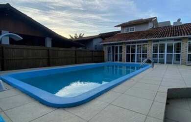 Imagem: A casa possui 5 Dormitórios, 4 Banheiros, 2 Vagas na garagem