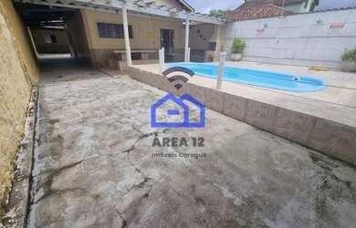 Imagem: A casa possui 4 Dormitórios, 3 Banheiros, 5 Vagas na garagem