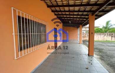 Imagem: A casa possui 2 Dormitórios, 3 Banheiros, 4 Vagas na garagem