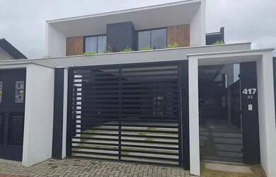 Imagem: A casa possui 3 Dormitórios, 1 Banheiro, 1 Vaga na garagem