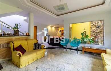 Imagem: A casa possui 5 Dormitórios, 5 Banheiros, 4 Vagas na garagem