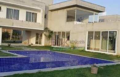 Imagem: A casa em condomínio possui 4 Dormitórios, 5 Banheiros, 4