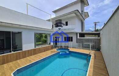 Imagem: A casa possui 4 Dormitórios, 3 Banheiros, 3 Vagas na garagem