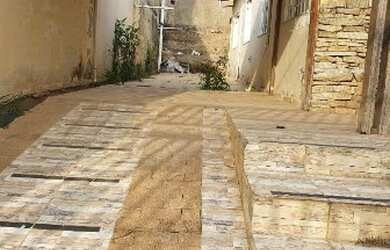 Imagem: A casa possui 2 Dormitórios, 1 Banheiro, 1 Vaga na garagem