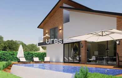 Imagem: A casa possui 4 Dormitórios, 5 Banheiros, 4 Vagas na garagem