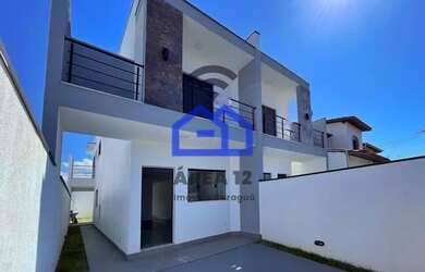 Imagem: A casa possui 3 Dormitórios, 3 Banheiros, 1 Vaga na garagem