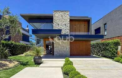 Imagem: A casa possui 5 Dormitórios, 5 Banheiros, 2 Vagas na garagem