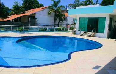 Imagem: A casa em condomínio possui 5 Dormitórios, 5 Banheiros, 5