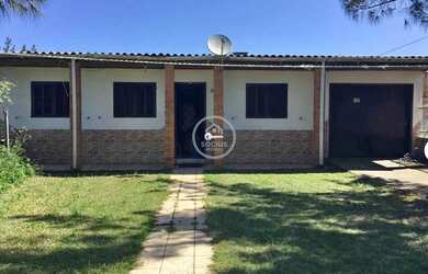 Imagem: A casa à venda possui 4 Dormitórios, 2 Banheiros, 2 Vagas