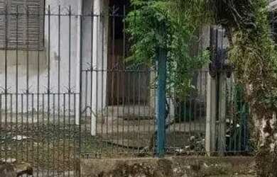 Imagem: A casa possui 3 Dormitórios, 2 Banheiros, 1 Vaga na garagem