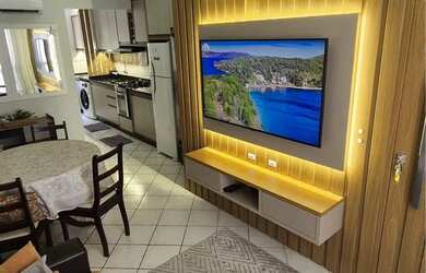 Imagem: O apartamento possui 3 Dormitórios, Acomodam 8 pessoas, 1 Vaga