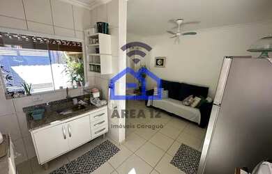 Imagem: A casa possui 3 Dormitórios, 2 Banheiros, 1 Vaga na garagem