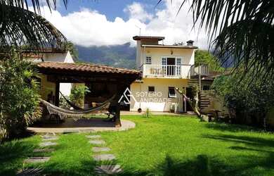 Imagem: A casa possui 2 Dormitórios, 1 Banheiro, 4 Vagas na garagem