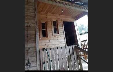 Imagem: A casa à venda possui 2 Dormitórios e 1 Banheiro e está localizado