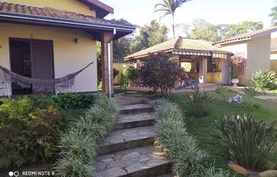 Imagem: A casa possui 1 Dormitório, 1 Banheiro, 5 Vagas na garagem