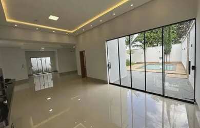 Imagem: A casa possui 3 Dormitórios, 3 Banheiros, 4 Vagas na garagem