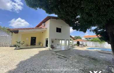 Imagem: A casa possui 5 Dormitórios, 5 Banheiros, 5 Vagas na garagem