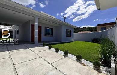 Imagem: A casa possui 3 Dormitórios, 4 Banheiros, 2 Vagas na garagem