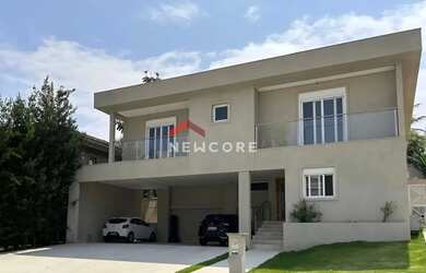 Imagem: A casa em condomínio possui 5 Dormitórios, 5 Banheiros, 4