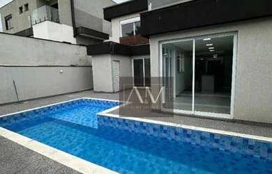 Imagem: A casa em condomínio possui 4 Dormitórios, 4 Banheiros, 2