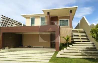 Imagem: A casa possui 4 Dormitórios, 2 Banheiros, 3 Vagas na garagem