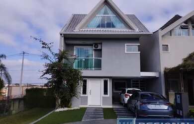 Imagem: A casa possui 3 Dormitórios, 1 Banheiro, 1 Vaga na garagem