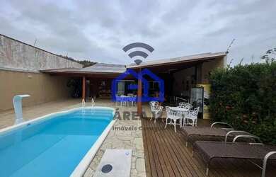 Imagem: A casa possui 2 Dormitórios, 2 Banheiros, 3 Vagas na garagem